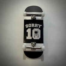 Load image into Gallery viewer, Sorry 10 year jersey 34mm silver trucks.
