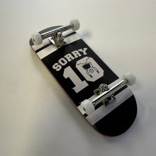 Load image into Gallery viewer, Sorry 10 year jersey 34mm silver trucks.
